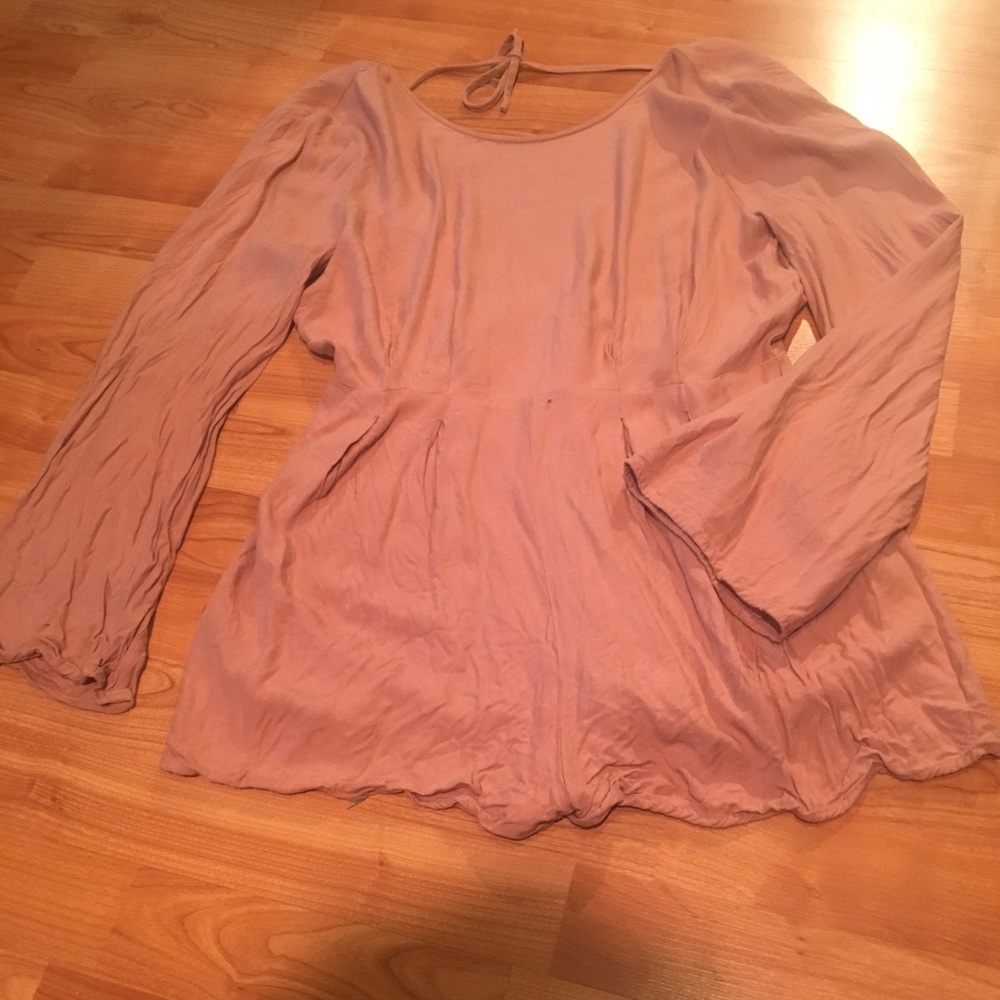 Blush pink romper with open back